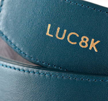 Womens Leather Belt displaying the luc8k logo on the leather belt